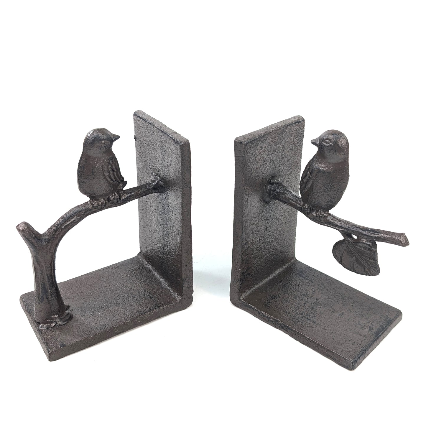 Cast iron bookends with birds perched on a branch