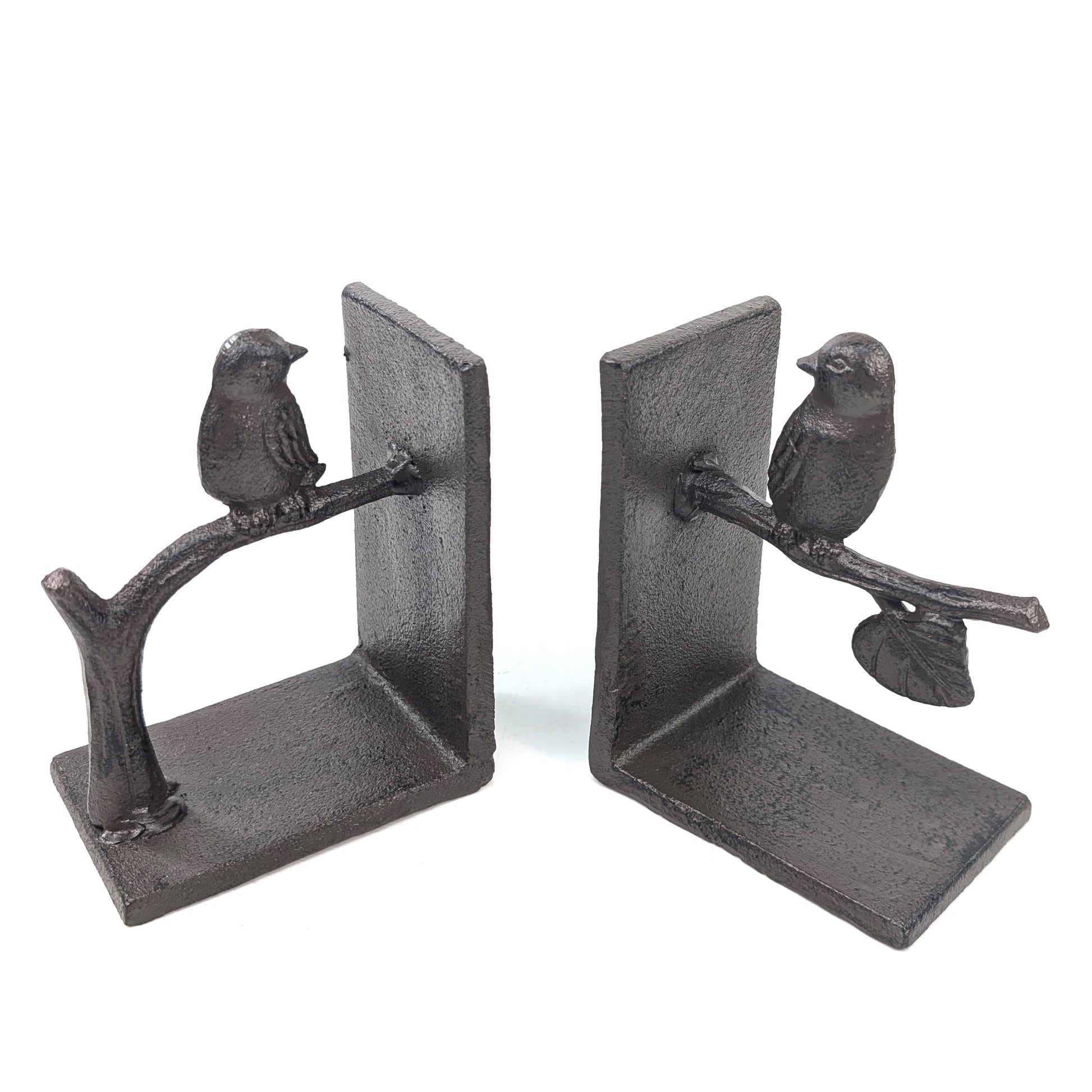 Cast iron bookends with birds perched on a branch