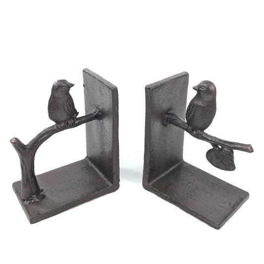 Cast iron bookends with birds perched on a branch