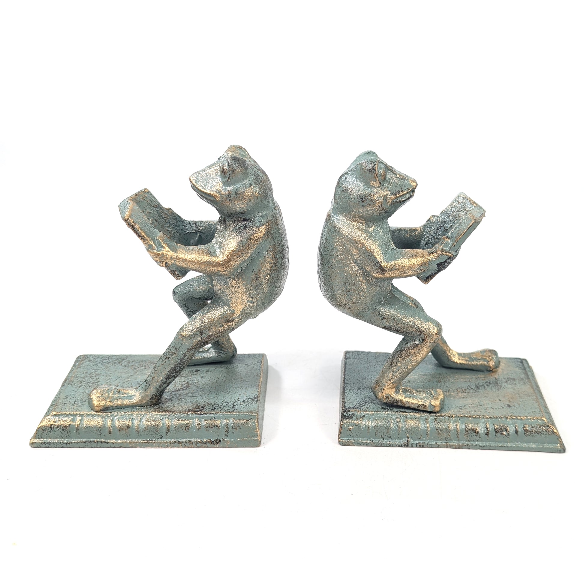 Two metal frog bookends made from durable cast iron