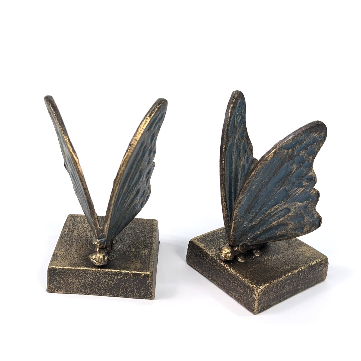 Angled view of the cast iron butterfly wings and square bases