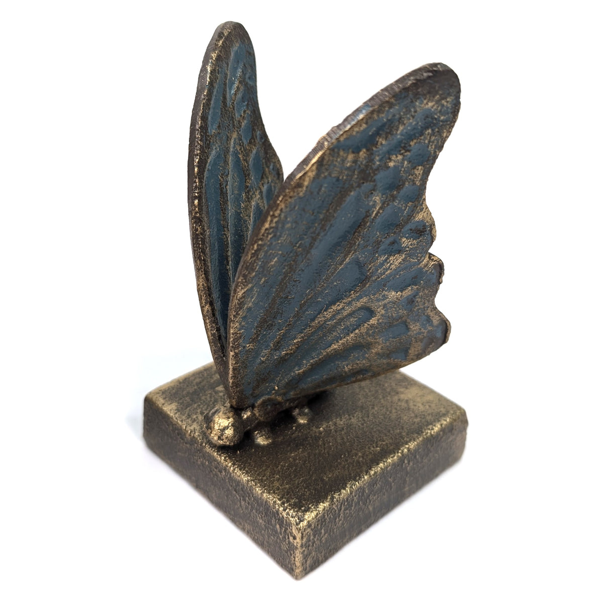 Close-up of a blue butterfly bookend with gold-coloured detailing