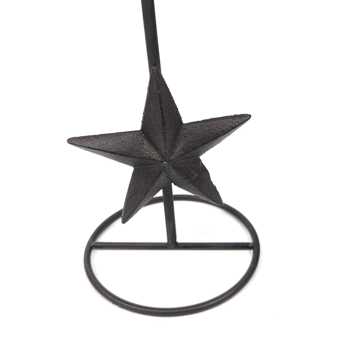Close-up of the textured cast iron star and circular base